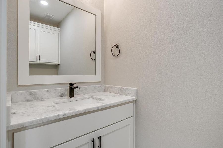 Bathroom featuring vanity