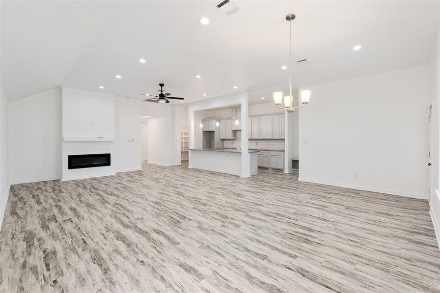 Open concept living room/ Dinning/kitchen area.