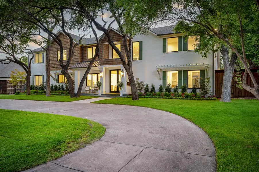 View of front of home with a yard