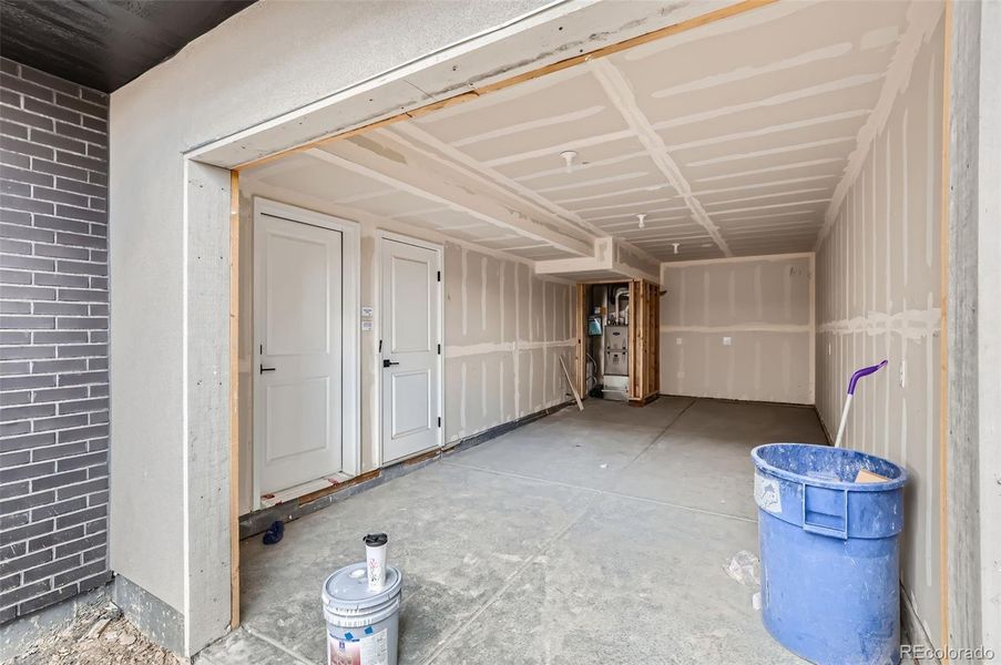 Oversized one-car garage and driveway offer extra storage space and parking. Mechanical room with Tankless Water Heater and HVAC