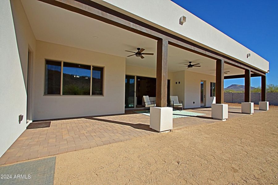 Large covered patio with pavers