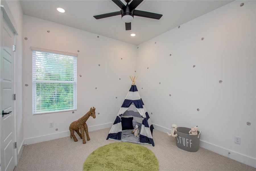 Secondary bedroom with access to the J&J bathroom. Model home photos - FINISHES AND LAYOUT MAY VARY! Ceiling fans are NOT INCLUDED!