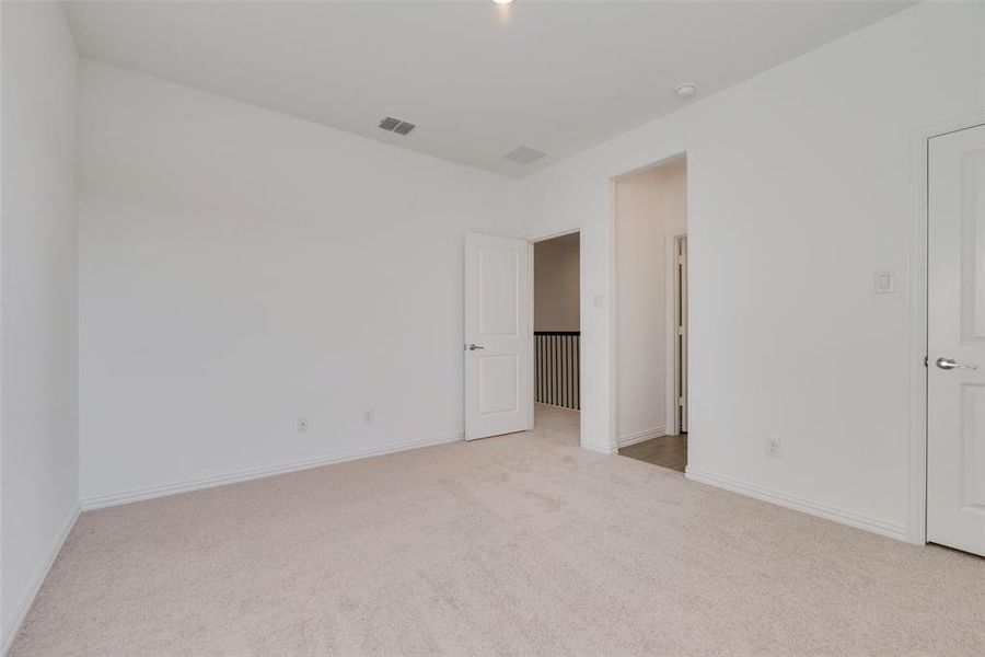 Unfurnished bedroom featuring carpet floors