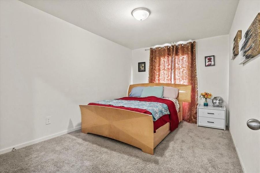 View of carpeted bedroom