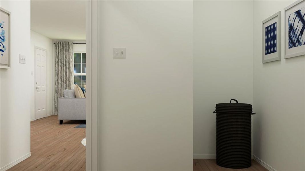 Hallway featuring light hardwood / wood-style flooring