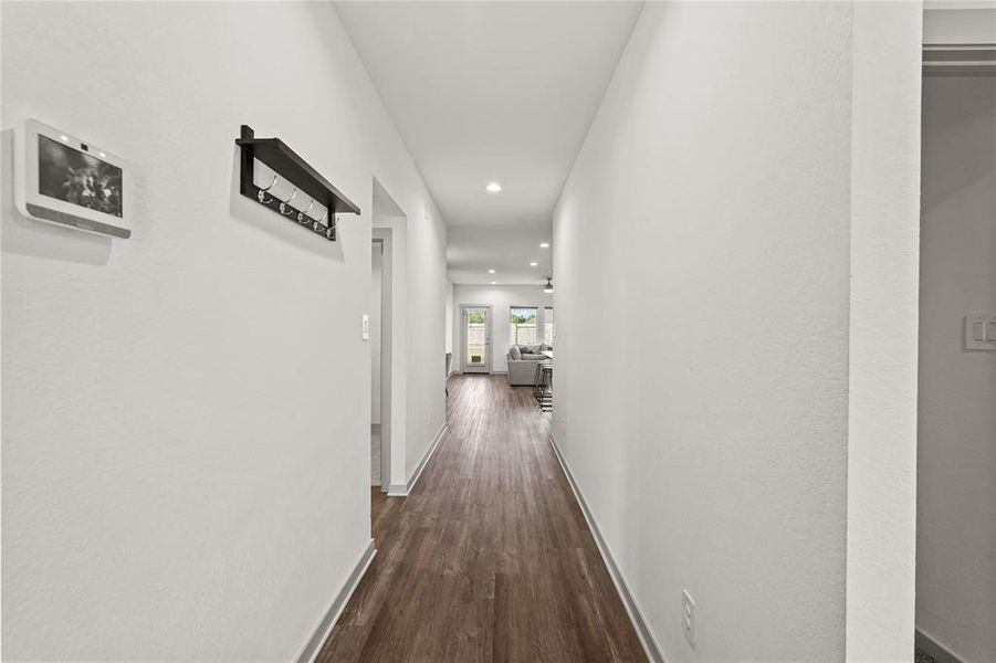 Light and bright interior with handsome vinyl wood plank flooring throughout