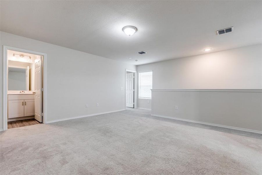 View of carpeted spare room