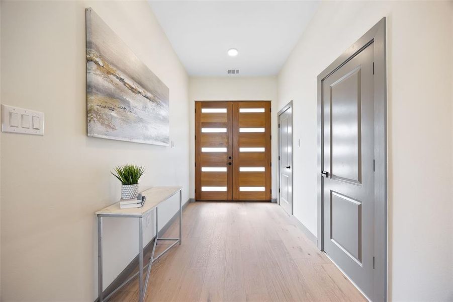 Entryway featuring light hardwood / wood-style flooring and french doors