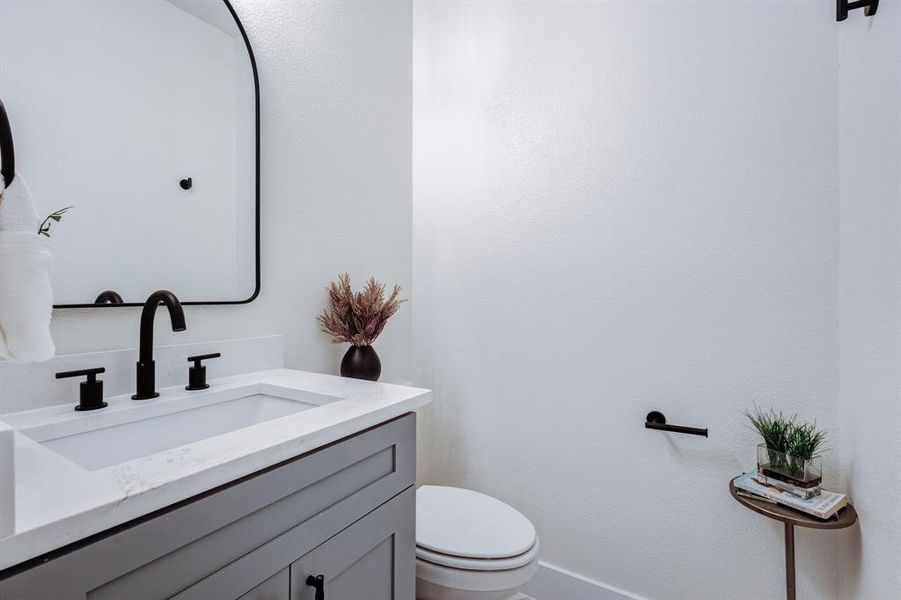 Bathroom with vanity and toilet