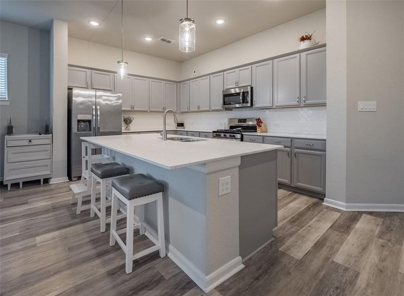 kitchen with breakfast bar spacious and lots of cabinet space