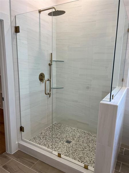 Bathroom featuring an enclosed shower