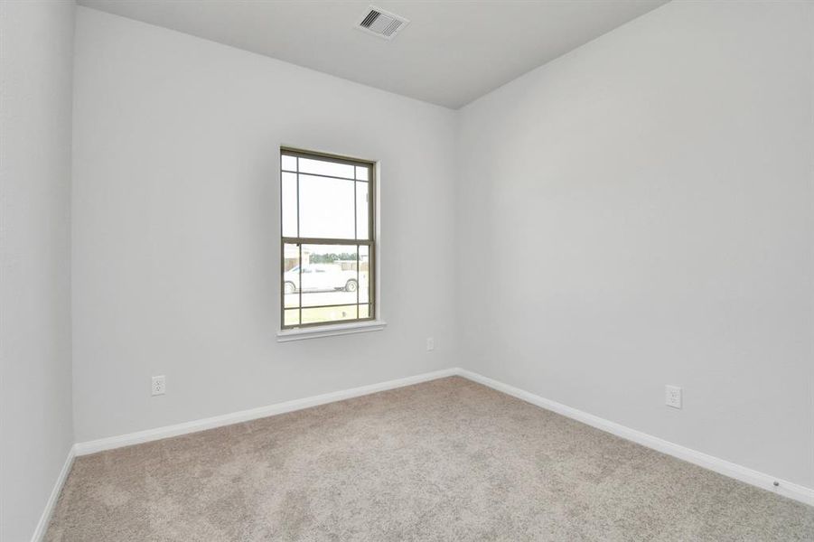 Another view of the secondary bedroom.