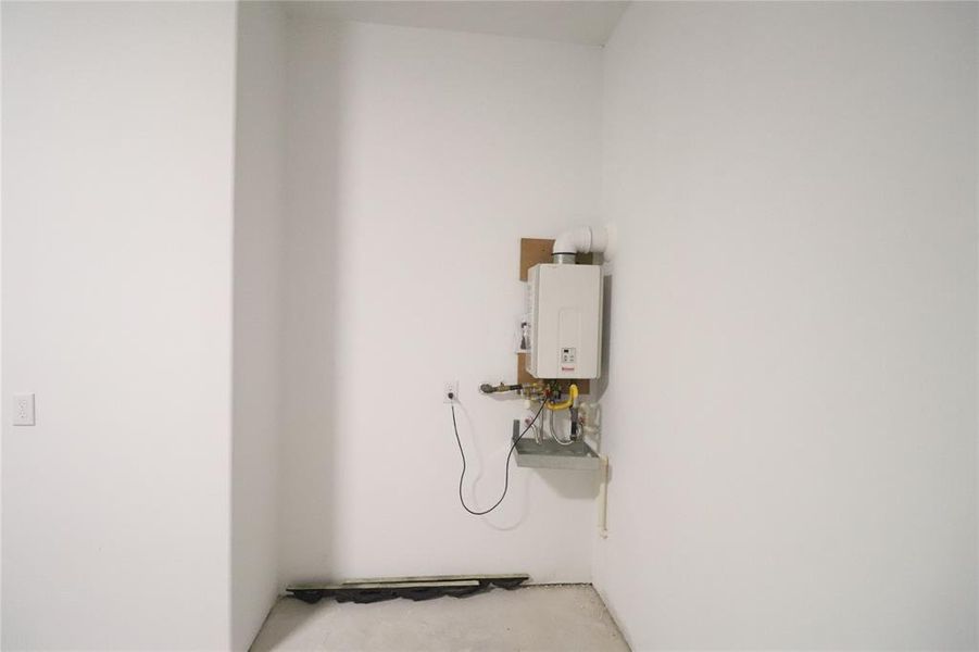 *Home has similar finishes** Upgraded high effeciency Gas Tankless Water heater inside garage. Smart gas tankless water heater available as an upgrade.