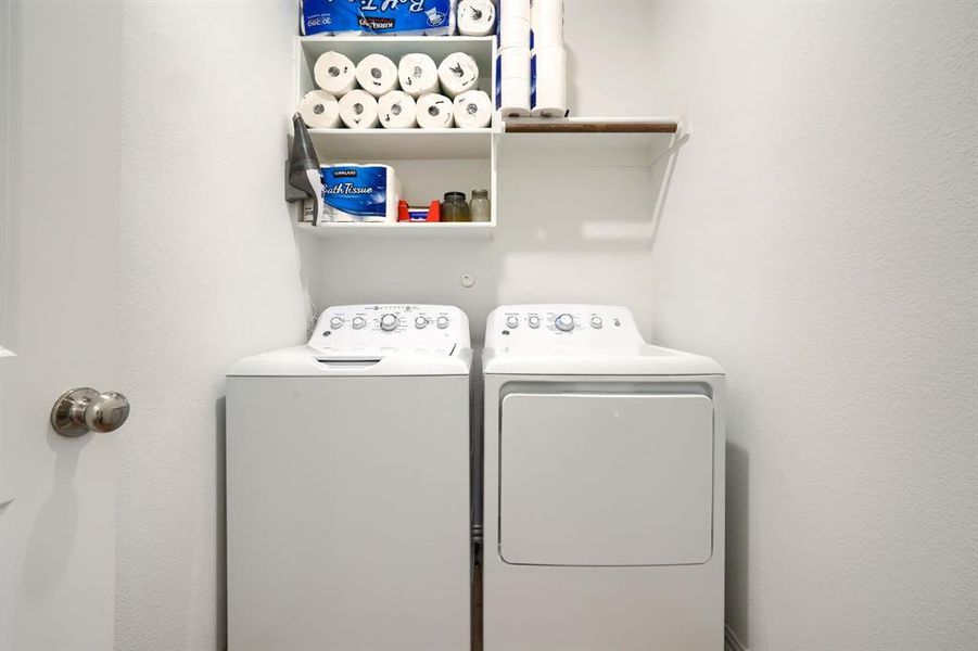 Utility Room. Washroom with washer and dryer