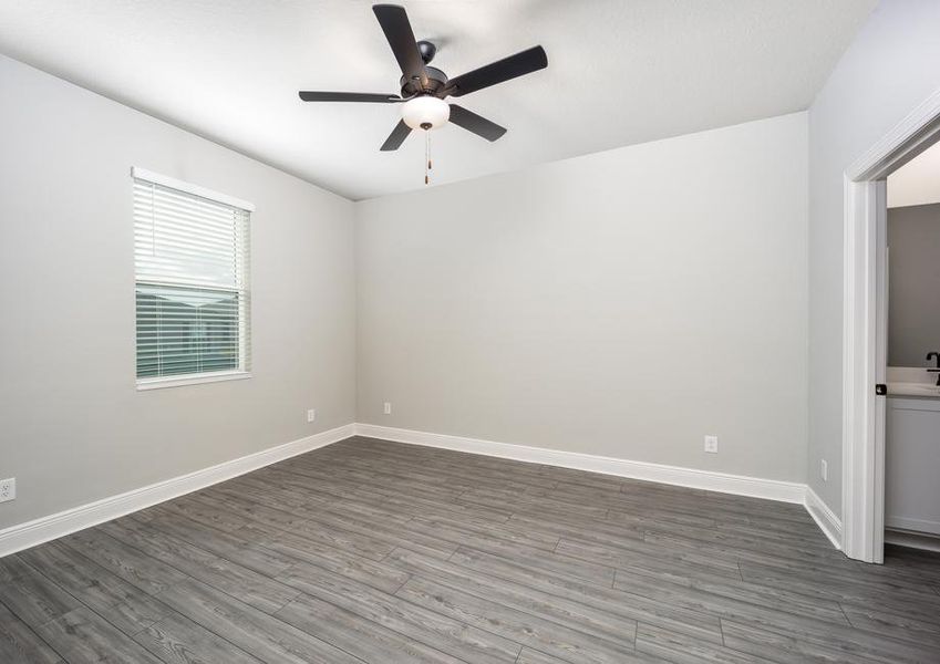 Vinyl plank flooring is found throughout the master retreat