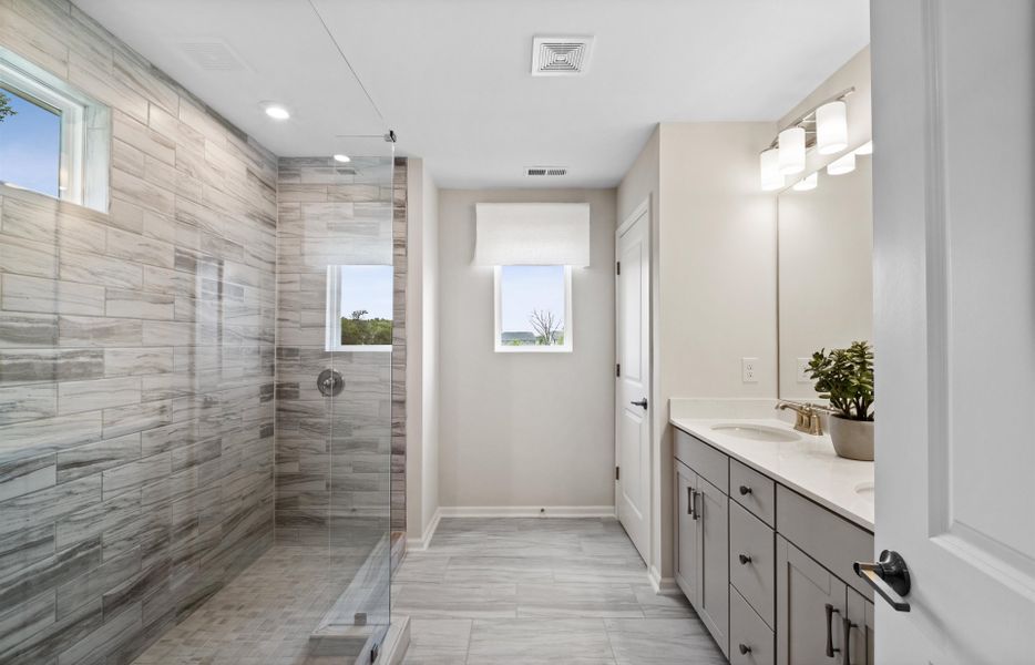 Owner's Bath with Dual Bowl Vanity and Walk-In Shower