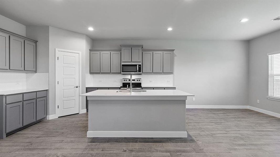 Kitchen - All Home and community information, including pricing, included features, terms, availability and amenities, are subject to change at any time without notice or obligation. All Drawings, pictures, photographs, video, square footages, floor plans, elevations, features, colors and sizes are approximate for illustration purposes only and will vary from the homes as built.