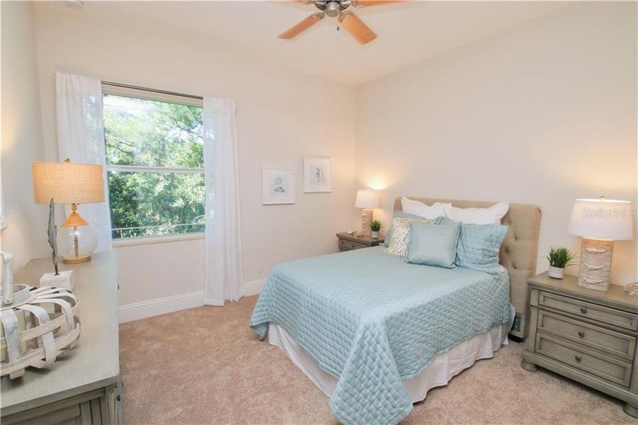 3rd bedroom  Pictures are of builder’s model, actual townhome may differ in elevation and options.