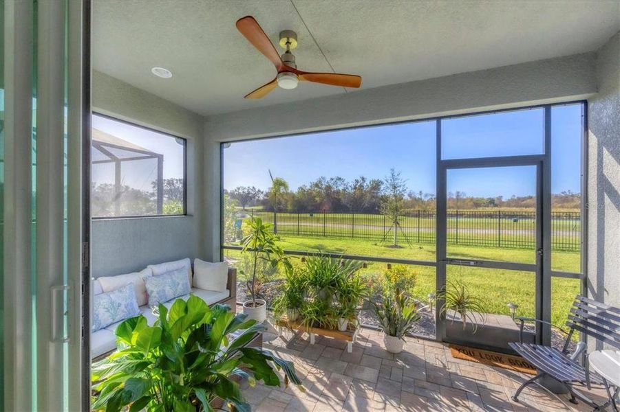 Screened lanai with golf & pond views