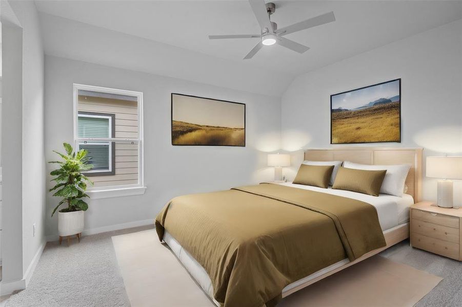Secondary bedroom features plush carpet, custom paint, dark stained ceiling fan with lighting and a large window with privacy blinds.