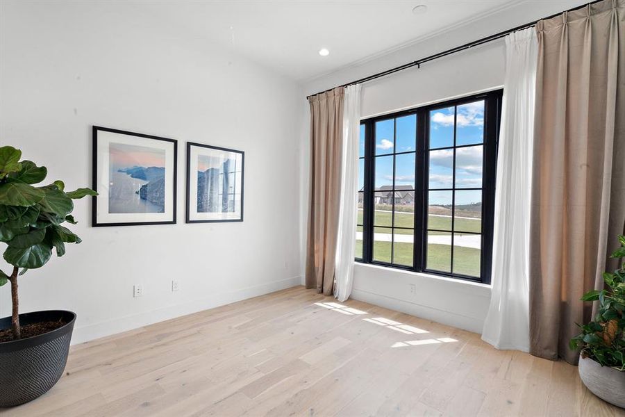 Unfurnished room featuring light hardwood / wood-style flooring