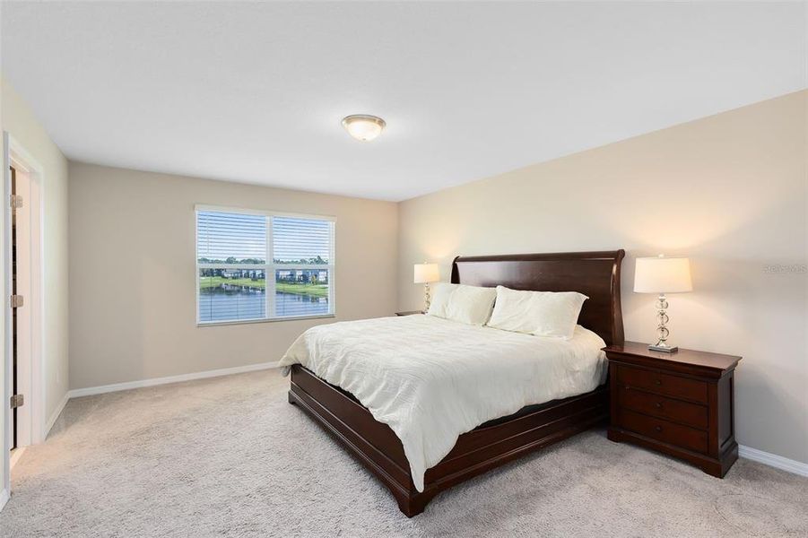 Primary Bedroom located on the 2nd floor offering beautiful views of the water