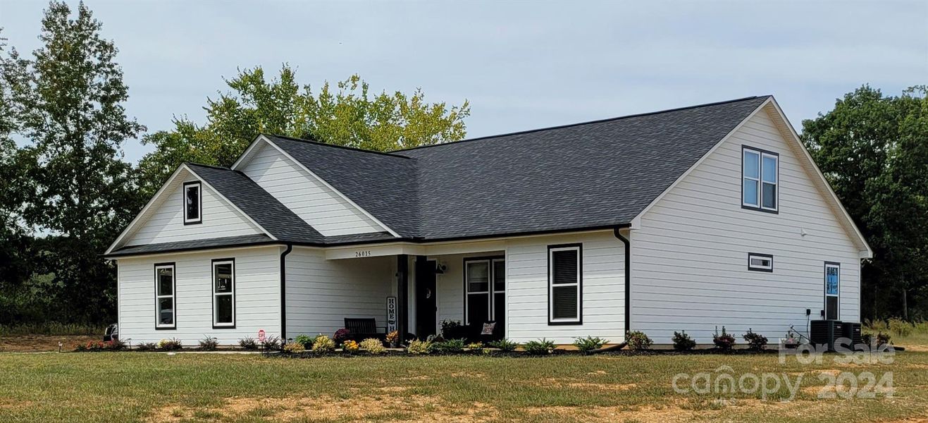 Lot 3 Plan has a FRONT LOAD Garage - Previous Build Photo of Austin Plan w/ Side Load Garage for Visual Purpose