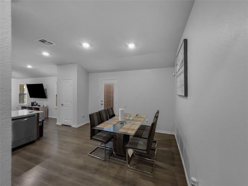 Dining space featuring dark hardwood / wood-style floors