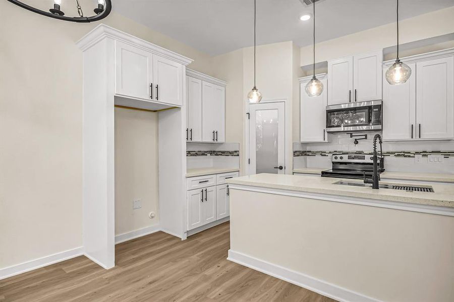 Additional storage above the refrigerator.