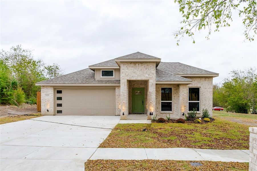 View of front facade with a garage