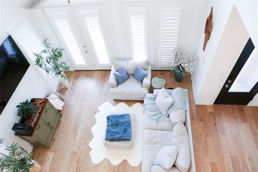 Living room with wood-type flooring