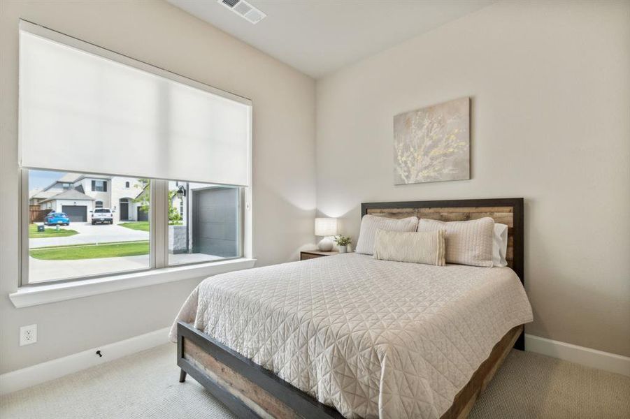 Bedroom with carpet flooring