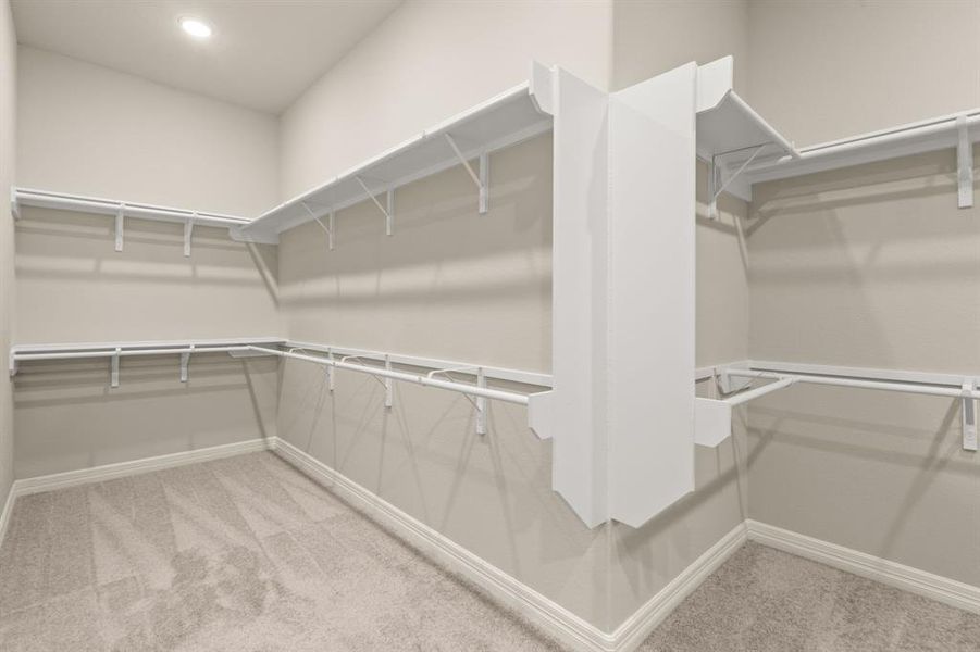 A view of your large primary walk-in Closet