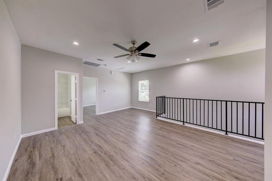 On this floor, you'll find two comfortable bedrooms and a full bathroom, perfect for family or guests. For added convenience, there’s also a utility closet located nearby, providing extra storage space to keep your home organized.