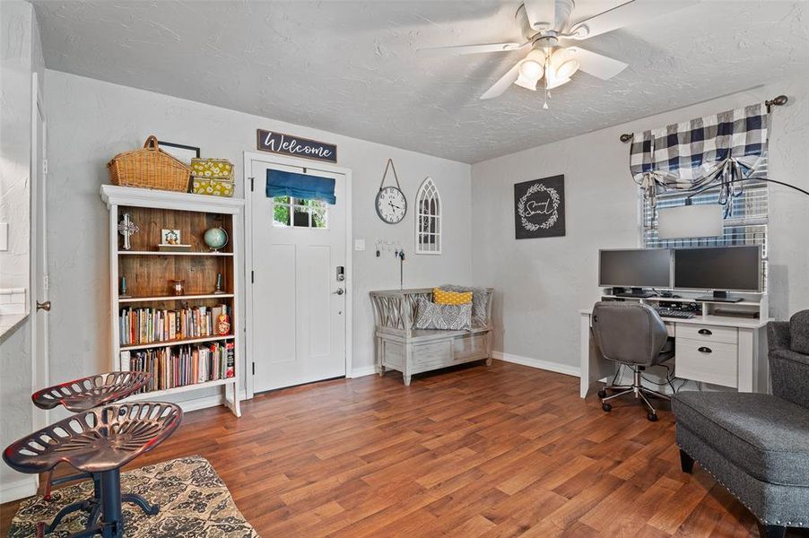 Office area featuring ceiling fan and hardwood / wood-style floors