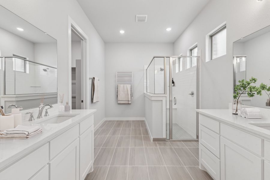 Primary Bathroom in the Matisse home plan by Trophy Signature Homes – REPRESENTATIVE PHOTO