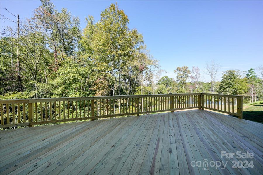 39x12 Deck in back with view of trees and water