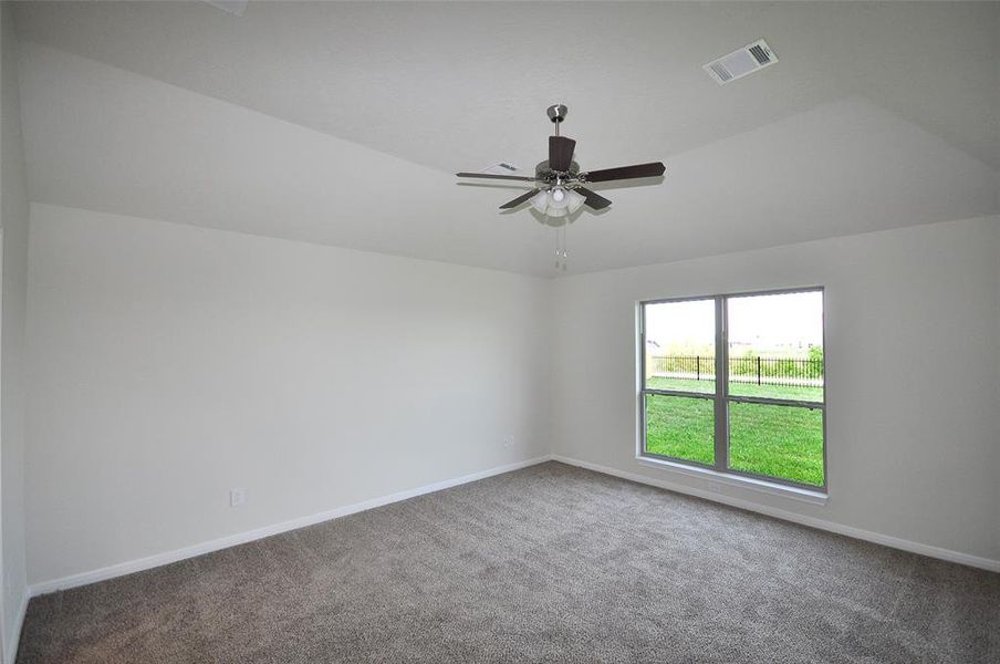 Master Bedroom ceiling vaults to 10feet providing that open, free feel.