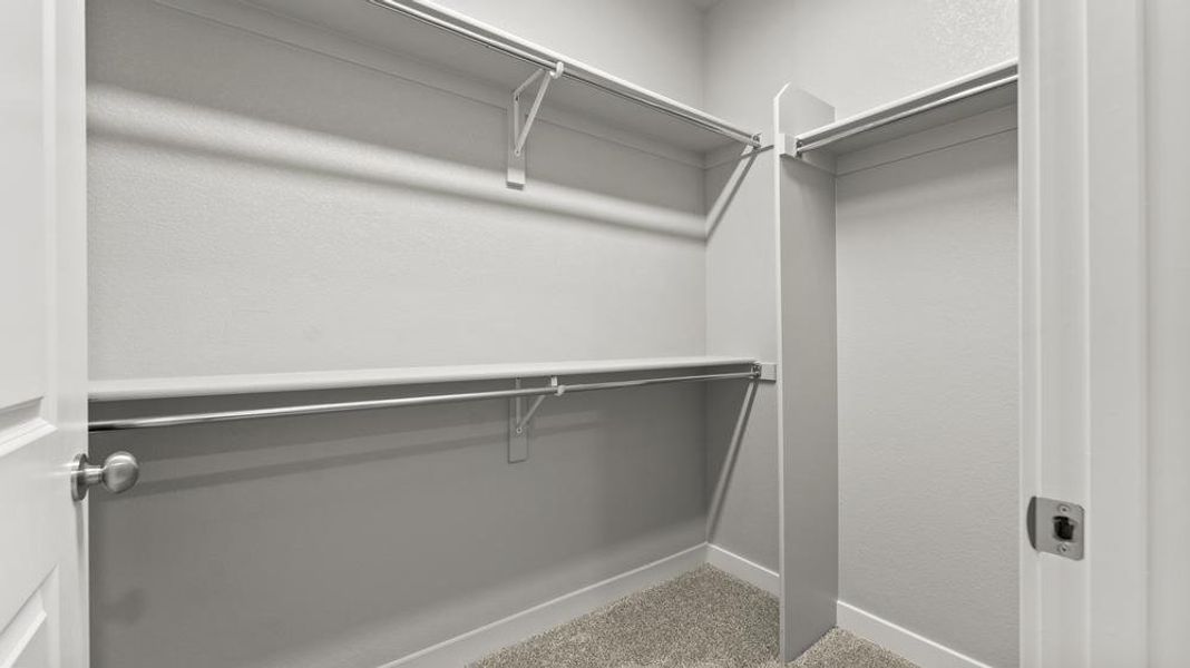 Primary Closet - Not Actual Home - Finishes May Vary