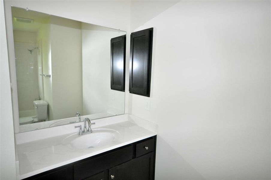 Vanity area of the Bedroom 2 ensuite bath.