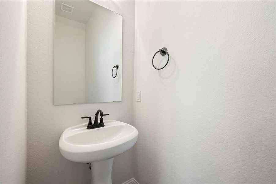 Interior of Powder Bath with Pedestal Sink