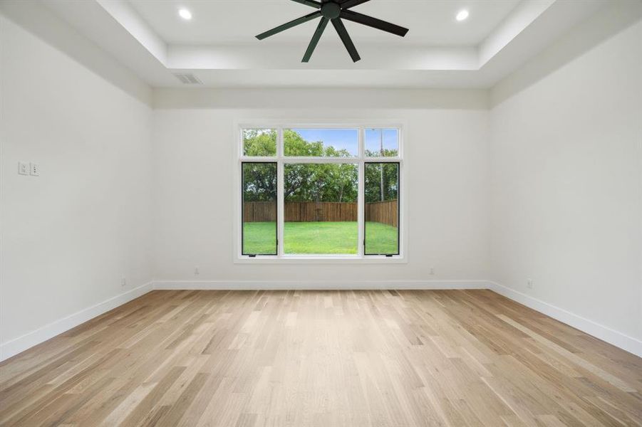 Large Primary Bedroom with beautiful Pella Windows