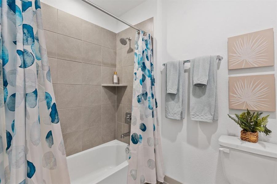 On the Right Wing this Guest Bathroom has Enclosed Tub and Shower Area, Tile Surrounding the Shower and more!  Oh, by the way All of our Commodes are Elongated in all of our Bathrooms!    **Image representative of plan only and may vary as built**NEW Photos coming soon!