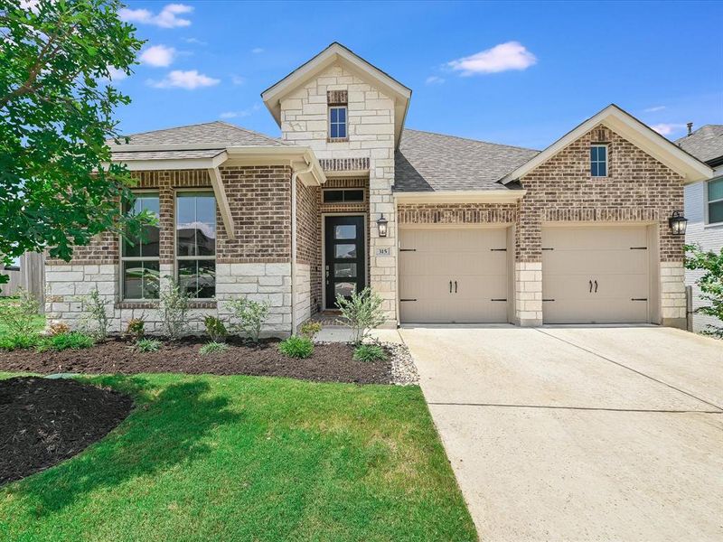 Welcome home! Beautiful curb appeal and highly upgraded! Almost new and still under warranty!