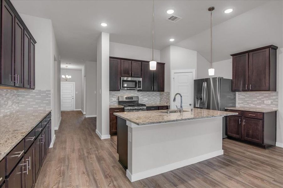 Gorgeous granite countertops and backsplash