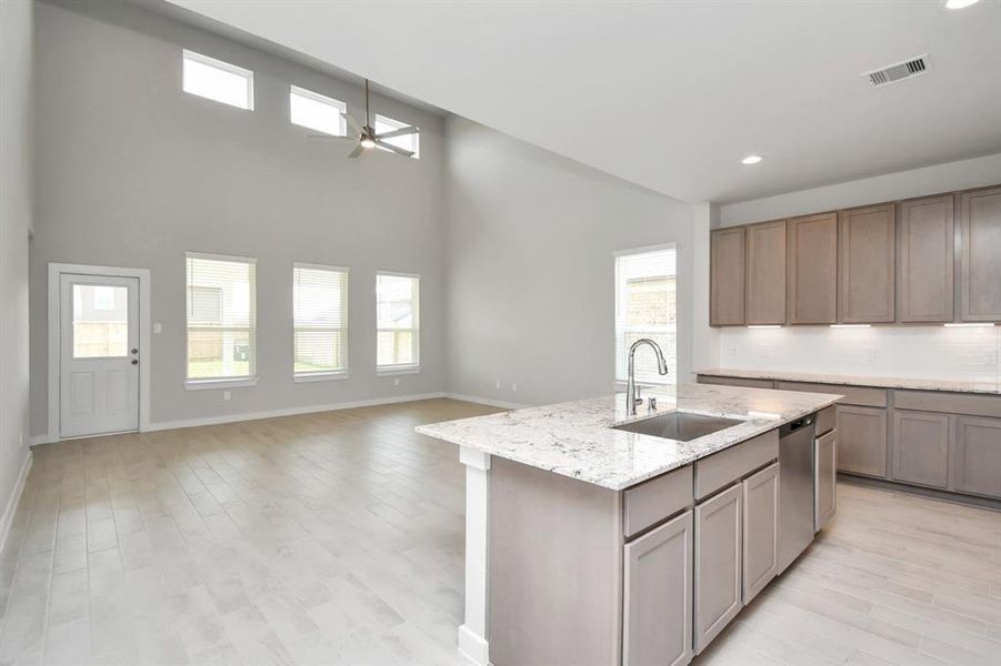 This generously spacious kitchen is a dream realized! Sample photo of completed home with similar floor plan. Actual colors and selections may vary.