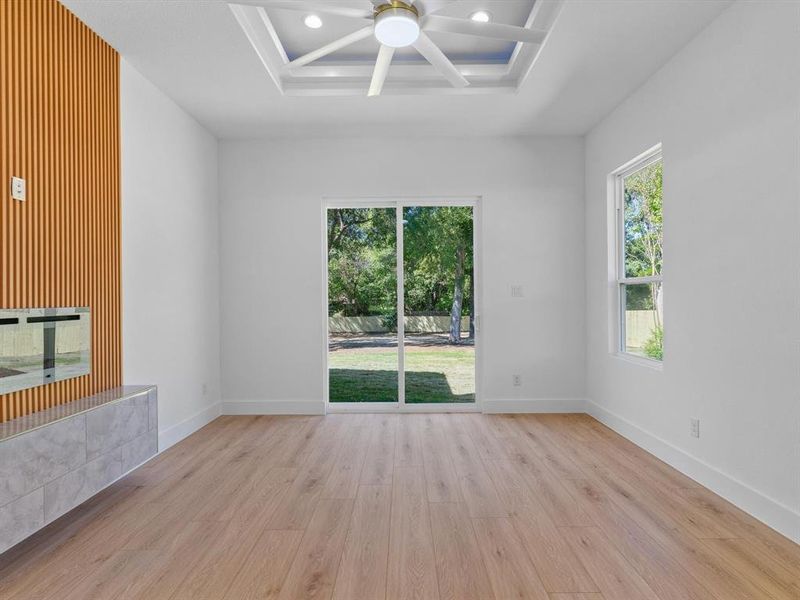 Spare room featuring ceiling fan and light wood-type flooring