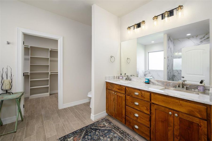 Bathroom with vanity and toilet