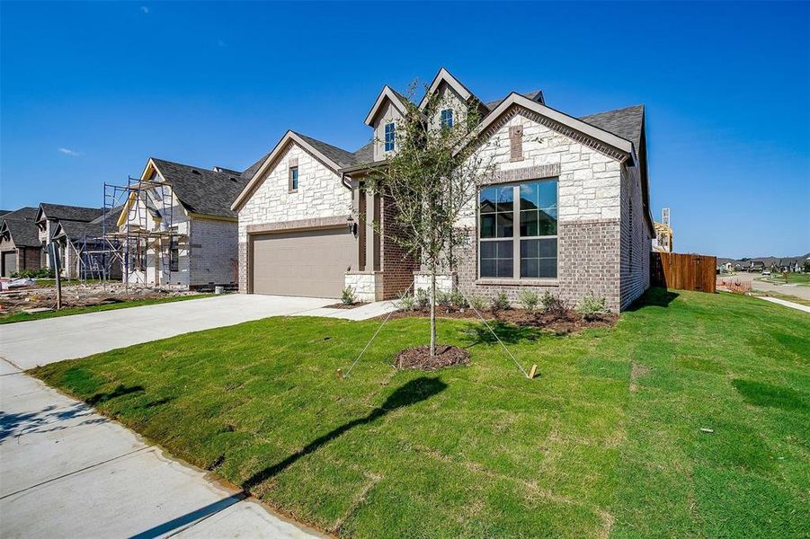 View of front of home with a front yard