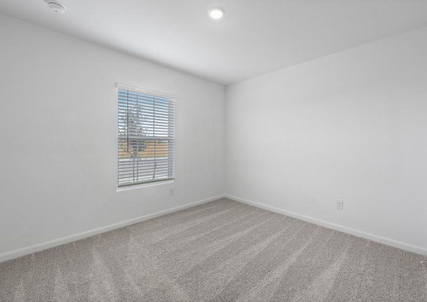 The spacious secondary bedroom room